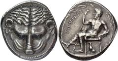 Greek coins Bruttium, Rhegium. Tetradrachm circa 435-425, AR 17.46 g. Lion's mask facing. Rev. RECINOS Apollo Iocastus seated l., himation over lower limbs; r. hand holding long staff and l. hand rest