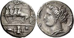 Greek coins Syracuse. Decadrachm signed by Euainetos circa 400 BC, AR 43.05 g. Fast quadriga driven l. by charioteer, holding reins and kentron; in field above, Nike flying r. to crown him. In exergue