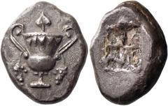 Greek coins Naxos. Stater circa 520-515-490, AR 12.19 g. Cantharus with ivy leaf finial on lid; grape bunches hanging from handles. Rev. Quadripartite incuse square. Nicolet-Pierre 1 (this coin). Jame