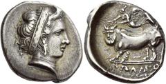 Greek Coins Nola Didrachm circa 400-385, AR 7.08 g. Head of nymph r., hair bound by large ribbon, wearing earring and necklace. Rev. NΩAIΩ[N] Man-headed bull walking l., crowned by Nike flying l. Samb