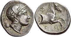 Greek Coins Pharsalus Drachm signed by the artists TH and AMN circa 420-350, AR 6.29 g. Head of Athena r., wearing Attic helmet decorated with wreath; cheek guard turned up. Behind the neck, TH. Rev. 