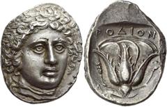 Greek Coins Rhodes Tetradrachm circa 404-385, AR 15.34 g. Laureate head of Helios facing three-quarters r. Rev. PΟΔION Rose with bud r.: in l. field, barley ear and below, Δ. Pozzi 2685 var. Jameson 1