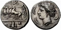 A remarkable selection of Greek Coins Syracuse Decadrachm signed by Euainetos circa 400, AR 42.44 g. Fast quadriga driven l. by charioteer, holding reins and kentron; in field above, Nike flying r. to