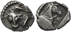 Greek Coins Greek Coins. Larissa. Obol circa 462/1-460, AR 0.98 g. Head of bull l., above, dolphin swimming l. Rev. ΛA Head of bridled horse r., all within incuse square. Liampi, 1996, IA, 16a, pl. 4,