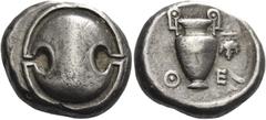 Greek Coins Greek Coins. Thebes. Stater circa 425-400, AR 12.14 g. Boeotian shield. Rev. Θ – E Amphora; in r. field, bunch of grapes. All within incuse area. SNG Copenhagen 306. BCD Boioitia 399. Old 