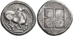 Ancient Greek Coins Aegae Stater circa 470-40, AR 9.01 g. Goat kneeling r., its head turned l.; above, ΔE in monogram. Rev. Quadri­partite incuse square. Raymond, ANS NNM 126, 5, pl. I, 6 (this obvers