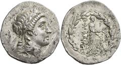 Ancient Greek Coins Colophon Tetradrachm circa 155-145, AR 16.56 g. Laureate head of Apollo r. Rev. ΚΟΛΟΦΩΝΙΩΝ Apollo Clarius standing r. with filleted branch and r. hand placed on lyre, all within la