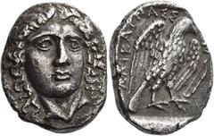 Ancient Greek Coins Caria, Halicarnassus Tetradrachm circa 375, AR 13.98 g. Laureate head of Apollo facing slightly to r. Rev. AΛIKAPNAΣΣ – [EΩ]N Eagle standing r. with open wings; in r. field, bow. A