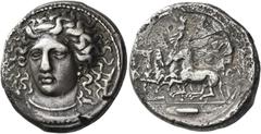 Greek Coins. Syracuse. Tetradrachm signed by Kimon circa 413-399, AR 16.52 g. Head of Arethusa facing slightly to l., wearing earring, necklace and ampyx inscribed [KIMΩN]; her hair flows in long curl