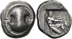 Greek Coins. Thebes. Stater circa 450-440, AR 11.65 g. Boeotian shield. Rev. ΘΕΒΑ - ΙΟΝ Heracles kneeling r., stringing bow held in his r. hand; in l. field., club. The whole within incuse square. Tra