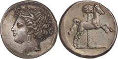 Siculo-Punic Coinage. Sicily, uncertain mint. Tetradrachm, c. 330 BC. (Silver, 17.09g., 26.2mm). Head of Tanit to left, wearing wreath of reeds, triple-pendant earring and pearl necklace, her hair bou
