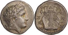 Northern Greece. Macedon, the Chalkidian League, Olynthos. Tetradrachm, c. 350 BC. (Silver, 14.44g., 24.7mm). Laureate head of Apollo to right, with his hair falling in long locks down the back of his