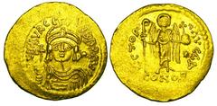 BYZANTINE EMPIRE. Maurice Tiberius, 582-602 AD. Gold Light-Weight Solidus (4.25 gm) of 23 Siliqua, Constantinople. Bust wearing plummed helmet and holding globus cruciger, star / Angel with long staff