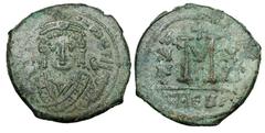 BYZANTINE EMPIRE. Maurice Tiberius, 582-602 AD. Æ Follis (12.18 gm) of Theoupolis (Antioch), yr. 15, off. Gamma. Crowned facing bust / Large M. S.533. VF+, olive green patina.