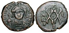 BYZANTINE EMPIRE. Tiberius II Constantine, 578-582 AD. Æ Half Follis (7.17 gm) of Antioch, yr 7 E. Armoured bust / Large XX. S.451. VF, olive brown patina. ex Khristnov collection. [Est. $150]