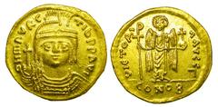 BYZANTINE EMPIRE. Maurice Tiberios, 582-602 AD. Gold Solidus (4.31 gm) of Antioch. Helmeted bust facing / Angel standing. S.524. off. I. Near Mint. [Est. $700]