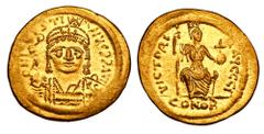 BYZANTINE EMPIRE. Justin II, 565-578 AD. Gold Solidus (4.47 gm) of Constantinople. Crowned bust facing / Constantinopolis seated. S.345. Mint.