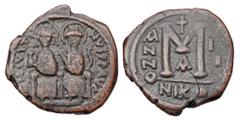 Byzantine BYZANTINE EMPIRE. Justin II, 565-578 AD. AE Follis (12.82 gm) of Nikomedia, yr. 3, A. Justin and Sophia enthroned / Large M. S.369. VF, brown patina. ex Royal Dutch collection, the Hague.