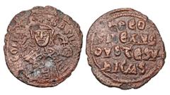 Byzantine BYZANTINE EMPIRE. Theophilus, 829-842 AD. AE Follis (7.56 gm) of Constantinople. Three-quarter figure standing holding labarum and orb / Inscription. S.1667. VF, brown patina, porosity. Scar