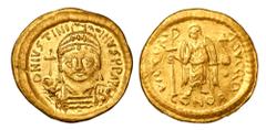Byzantine Coins BYZANTINE EMPIRE. Justinian I, 527-565 AD. Gold Solidus (4.26 gm) of Constantinople. Armored bust, facing, holding orb and shield / Angel standing holding long cross and orb. S.139. aX