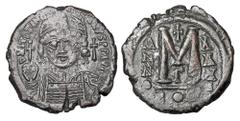 Byzantine Coins BYZANTINE EMPIRE. Justinian I, 527-565 AD. Æ Medium Module Follis (14.53 gm) of Constantinople, yr 31, Gamma. Crowned bust facing / Large M. S.163. VF, brown patina.