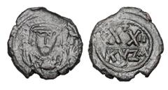 Byzantine Coins BYZANTINE EMPIRE. Phokas, 602-610 AD. Æ Half Follis (5.96 gm) of Kyzikos, yr 2 A. Crowned bust in consular robes / Large XX. S.668. VF, green black patina. ex Khristnov collection. Sca