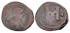 Byzantine Coins BYZANTINE EMPIRE. Justinian I, 527-565 AD. Æ Follis (13.97 gm) of Antioch, off G. Diademed draped bust / Large M, between stars. S.216. aVF, brown patina.