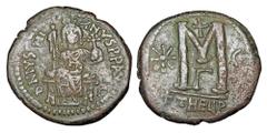 Byzantine Coins BYZANTINE EMPIRE. Justinian I, 527-565 AD. Æ Follis (17.27 gm) of Antioch. Emperor enthroned / Large M. S.214. VF, green brown patina. Scarce, nice face for issue.