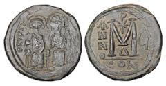 Byzantine Coins BYZANTINE EMPIRE. Justin II, 565-578 AD. Æ Follis (14.31 gm) of Constantinople, yr.5, off. D. Justin and Sophia enthroned facing / Large M, Cross above. S.360. VF, green patina.