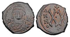 Byzantine Coins BYZANTINE EMPIRE. Maurice Tiberius, 582-602 AD. Æ Half Follis (5.49 gm) of Antioch. Crowned robed bust / Large XX. S.534. VF, brown patina with earthen highlights. ex Hoffman collectio