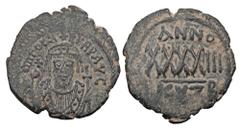 Byzantine Coins BYZANTINE EMPIRE. Phocas, 602-610 AD. Æ Follis (12.40 gm) of Kyzikos, yr. 3 B. Crowned bust facing / Large XXXX. S.665. XF, green patina.