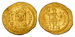 Byzantine BYZANTINE EMPIRE. Justin II, 565-578 AD. Gold Solidus (4.41 gm) of Constantinople. Helmeted bust facing / Constantinopolis seated. S.345. aXF.