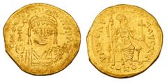 Byzantine Coins BYZANTINE EMPIRE. Justin II, 565-578 AD. Gold Solidus (4.31 gm) of Constantinople. Crowned facing bust holding Victory / Constantinopolis seated holding sceptre and orb. S.345. XF.
