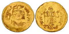 Byzantine Coins BYZANTINE EMPIRE. Maurice Tiberios, 582-602 AD. Gold Solidus (4.46 gm) of Constantinople. Helmeted bust facing / Angel standing facing. S.478. aXF.