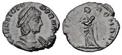 Roman Imperial Coins THEODORA, stepmother of Constantine I, d. 328 AD. Æ Reduced Follis (1.38 gm) of Trier 337-40. Draped bust / Pietas standing holding infant. RIC.48(R). Near Mint, dark brown patina