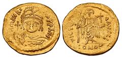 Byzantine Coins BYZANTINE EMPIRE. Maurice Tiberios, 582-602 AD. Gold Solidus (4.31 gm) of Constantinople. Helmeted bust facing / Angel standing facing. S.478. aXF.