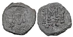 Byzantine Coins BYZANTINE EMPIRE. Constantine IV, 668-685 AD. Æ Follis (3.56 gm) of Syracuse. Crowned bust facing / Large M between Heraklios & Tiberios. S.1207. Uneven VF, slightly rough green patina