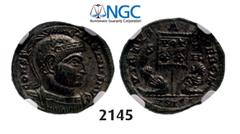 ROMAN EMPIRE Æ3 (Nummus) (Struck 320 AD) Siscia, Billon (2.32g) Obv. Æ3 (Nummus) (Struck 320 AD) Siscia, Billon (2.32g) Obv.: Helmeted and cuirassed bust right. Rev.: Two captives seated at base of ba