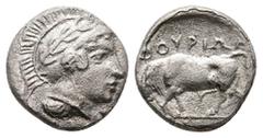 Greek Southern Lucania, Thourioi, c. 443-400 BC. AR Triobol (12 mm, 1.09 g). Head of Athena r., wearing crested Attic helmet decorated with wreath. R/ Bull standing l. HNItaly 1759. Near VF