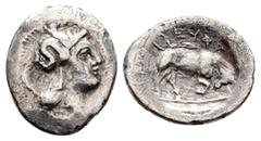 Greek Southern Lucania, Thourioi, c. 350-300 BC. AR Triobol (13 mm, 0.77 g). Head of Athena r., wearing crested Attic helmet decorated with Skylla. R/ Bull butting r.; EYΦA above. HNItaly 1832; SNG AN