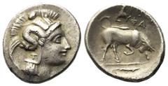 Greek Lucania, Thourioi (c. 350-300 BC), Triobol; AR (1,13 g; 12,2 mm) Head of Athena r., wearing pearl necklace, pendant earring, and crested Attic helmet ornamented with Scylla throwing rock; Rv. [Θ