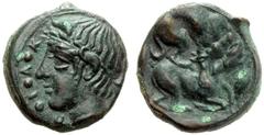 Sicily, Tetras,Piakos, c. 425-420 BC, AE, (g 2,21 , mm 13 , h 10). ΠIAK, laureate head of river god l., at l. three pellets, Rv. Dog attacking stag r.. CNS II, 1. Very rare. Green patina with brown to