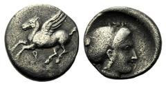 Monete greche / Greek Coins Corinzia, Dracma, Corinto, c. 400-380 a.C., AR, (g 2,45, mm 15, h 3). Pegaso in volo a s.; sotto Ϙ, Rv. Testa di ninfa a d., indossa sakkos. SNG Copenhagen 138-140. Non com