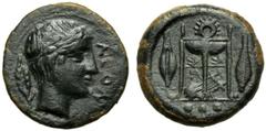 Sicily, Leontini, Tetras, c. 405-402 BC; AE (g 1,83; mm 13; h 11); ΛEON, laureate head of Apollo r.; at l. olive-leaf, Rv. Tripod; at side two grain; in ex. three pellets. CNS III, n. 3; SNG Copenhage
