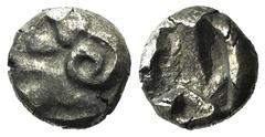 Greek world and ancient Near East Ionia, Uncertain, c. 5th century BC. AR Tetartemorion (5mm, 0.16g). Head and neck of ram l. R/ Incuse punch. VF