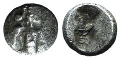 Greek world and ancient Near East Cilicia, Uncertain, c. late 5th century BC. AR Tetartemorion (5mm, 0.16g). Crowned head of Persian king r. R/ Rough incuse square. Troxell & Kagan 16 var. (head l.); 