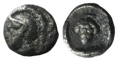 Greek world and ancient Near East Cilicia, Soloi, c. 410-375 BC. AR Hemiobol or Tetartemorion (5mm, 0.24g, 9h). Helmeted head of Athena l. R/ Grape bunch within linear circle. SNG Levante 48 var. (hea