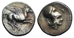Greek Corinth, c. 400-375 BC. AR Stater (22mm, 8.22g, 6h). AR Stater (22mm, 8.22 g, 12h). Pegasos flying r. R/ Helmeted head of Athena r.; dolphin before. Pegasi 346; BCD Corinth 89. VF