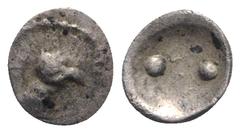 Greek Sicily, Akragas, c. 460-450/446 BC. AR Hexas or Dionkion (4mm, 0.10g). Eagle head r.; A before. R/ Two pellets. Westermark, Coinage, 523; HGC 2, 120 var. (eagle head l.). Very Rare, VF