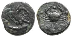 Greek Sicily, Akragas, c. 425/0-410/06 BC. Æ Hemilitron (27.5mm, 21.88g, 6h). Eagle standing l. on fish. R/ Crab holding serpent in l. claw; octopus and conch shell below. Westermark, Coinage, 648; CN
